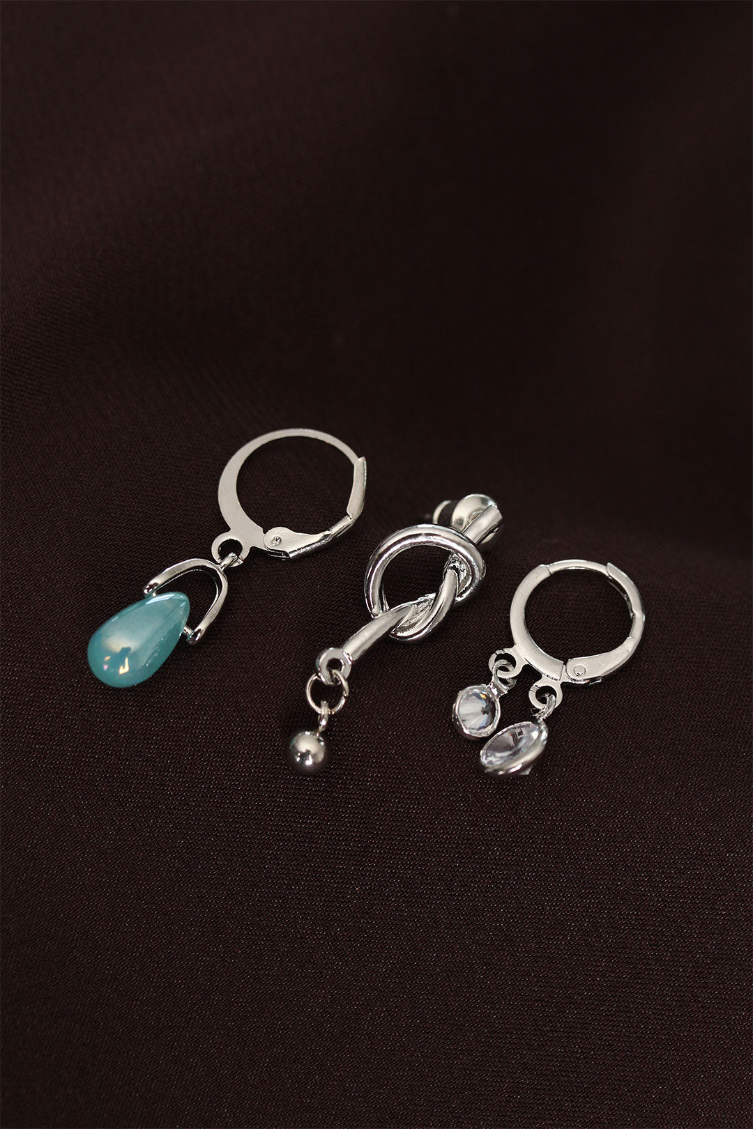 EBJ Knot Model Silver Color Metal Earrings with Blue Stone Detail - Keller