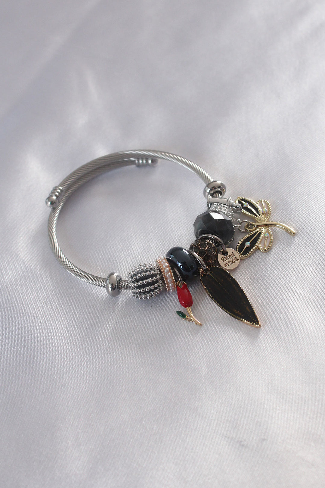 EBJ Steel Charm Model Black Butterfly Figure Leaf Detail Women's Bracelet - Purísima de Bustos