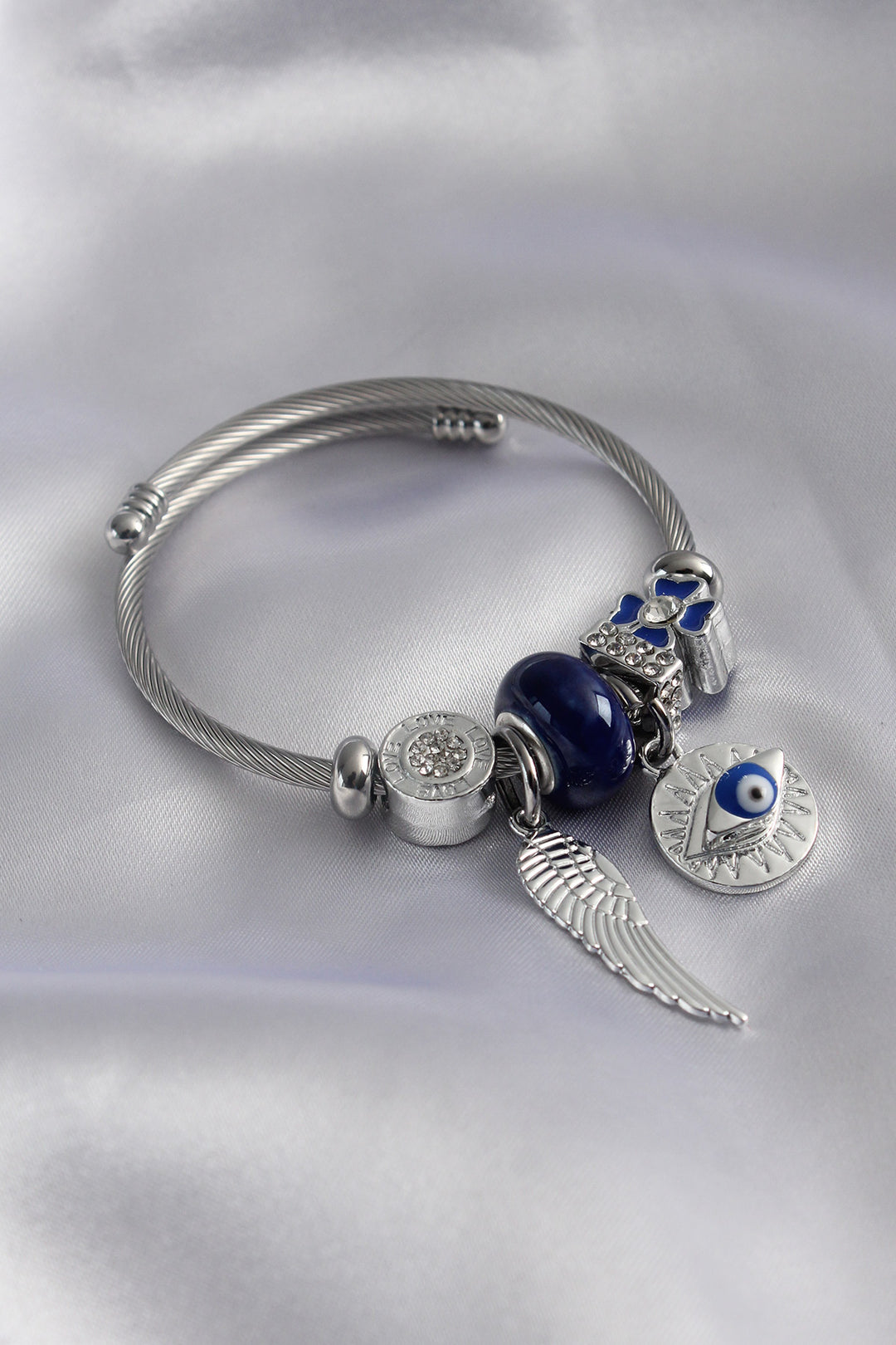 EBJ Silver Navy Color Eye Figure Wing Detail Zircon Stone Charm Model Women's Bracelet - Marietta