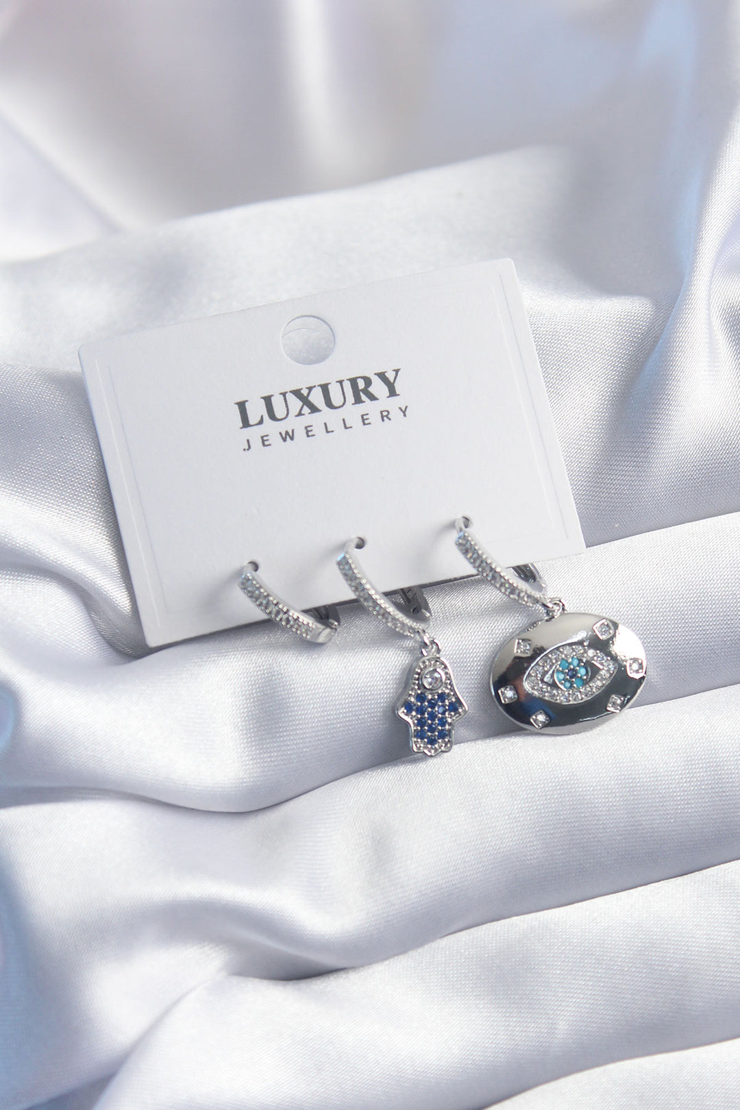 EBJ Rice Silver Color Zircon Stone Eye Model Fatima Hand Figure 3-Piece Women's Earring Set - Cambridge