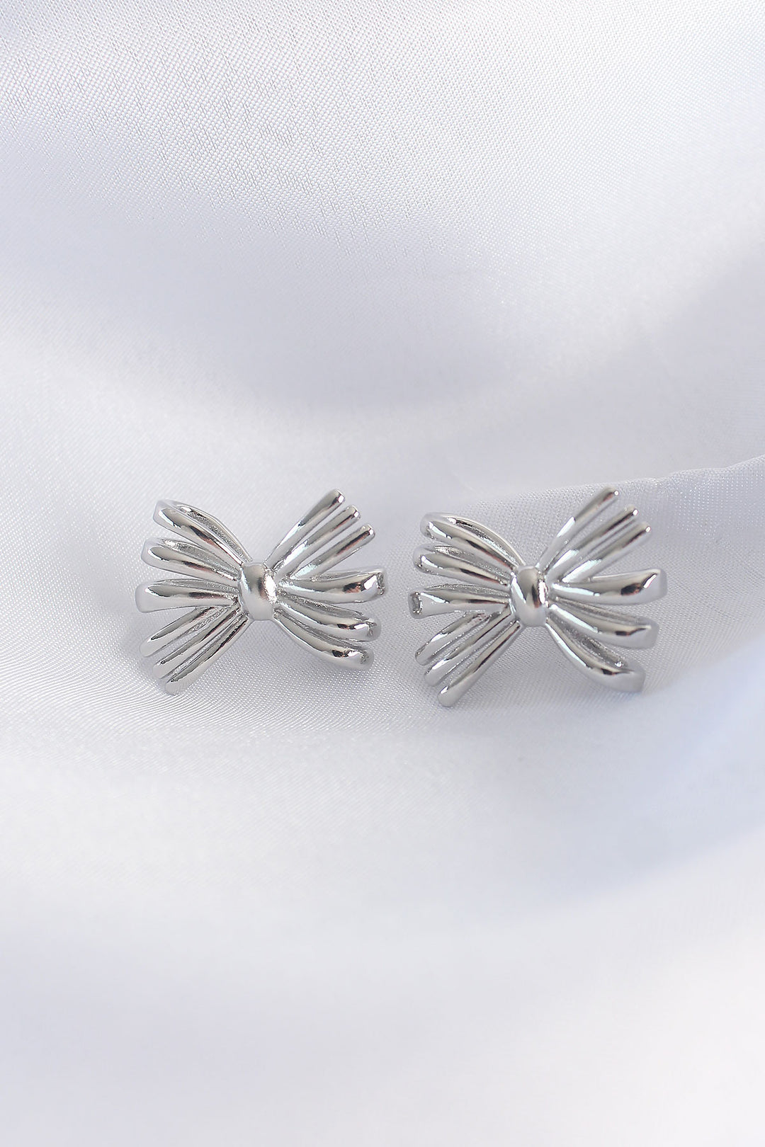 EBJ Rice Silver Color Bow Earrings - Burnsville