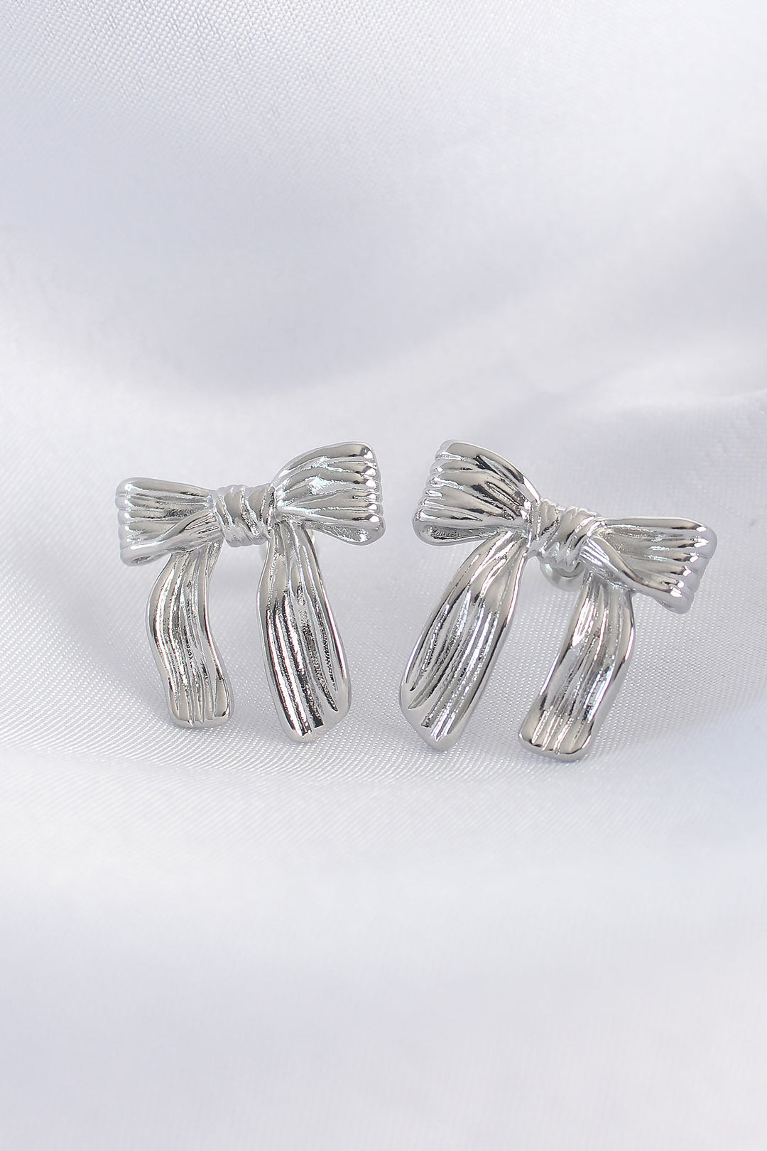 EBJ Rice Silver Color Stripe Detail Bow Earrings - Waukegan