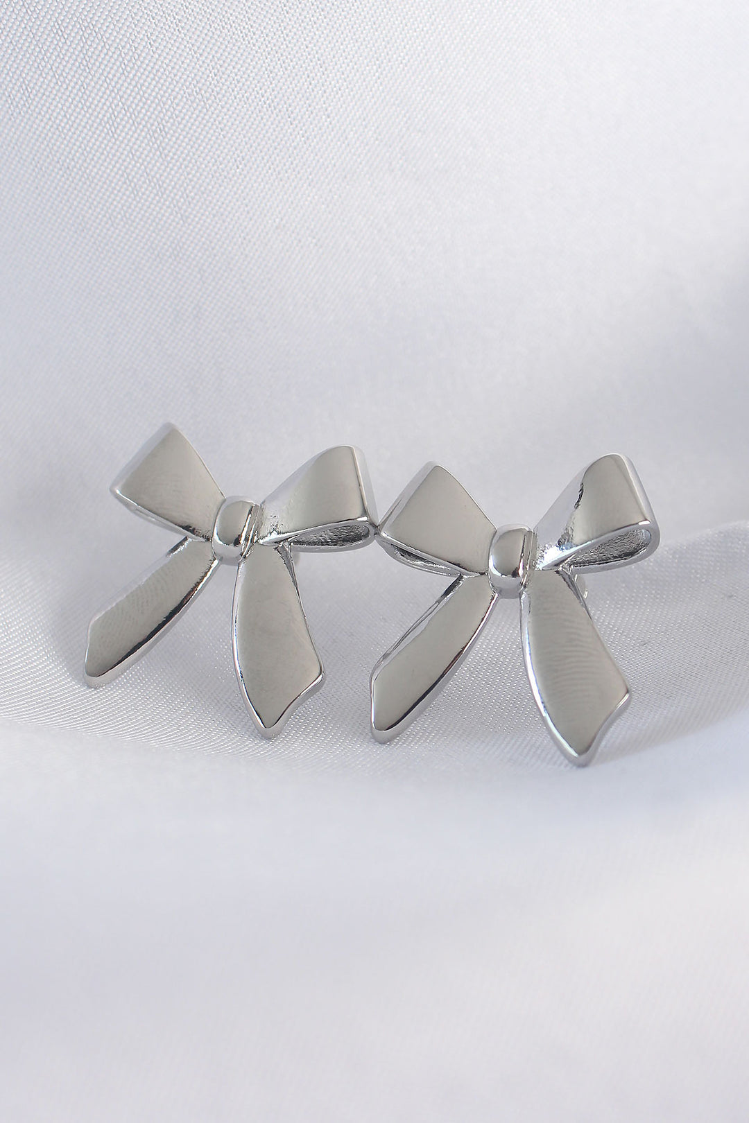 EBJ Rice Silver Color Flat Plate Bow Earring - Stralsund