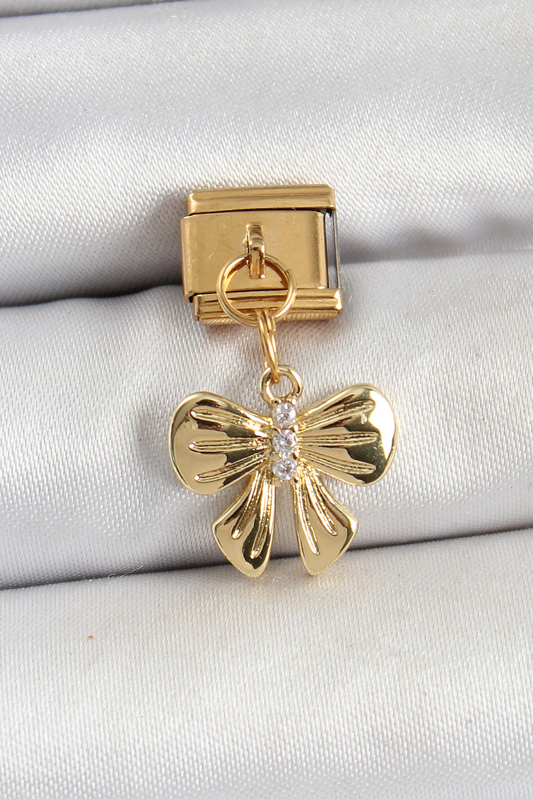 EBJ 316L Stainless Steel Dangling Zircon Stone Bow Model Gold Color Nomination Charm - Zaragoza