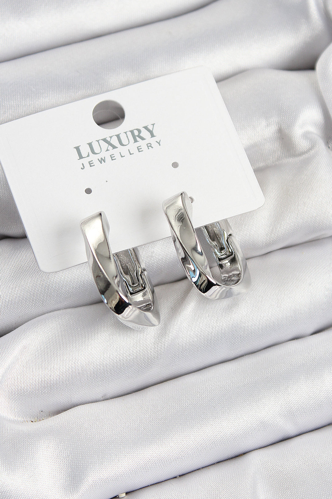EBJ Rice Grain Curved Rectangle Model Silver Color Women's Earrings - Cincinnati