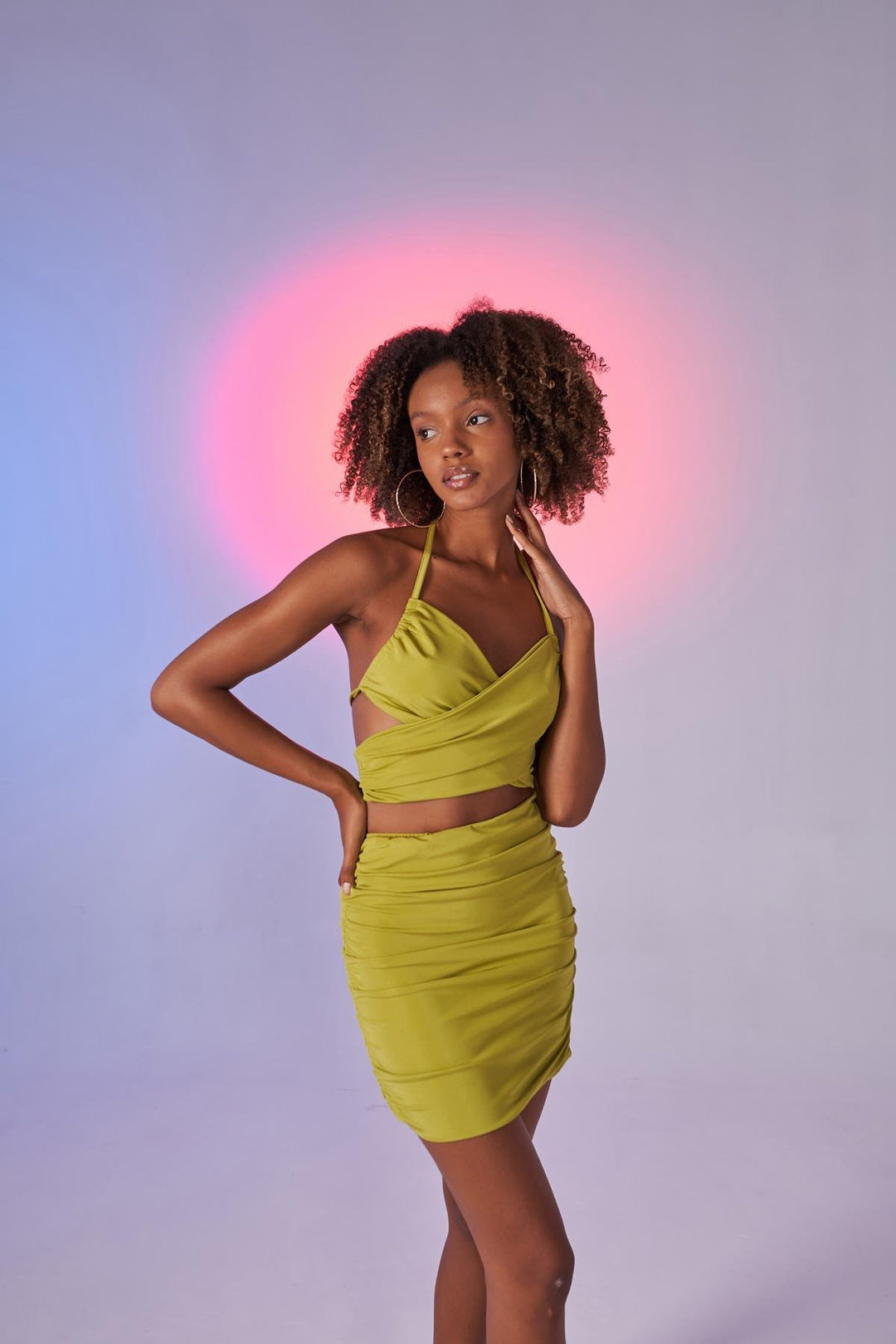 HLLY Women Jessa wears a green blouse. - Woonsocket