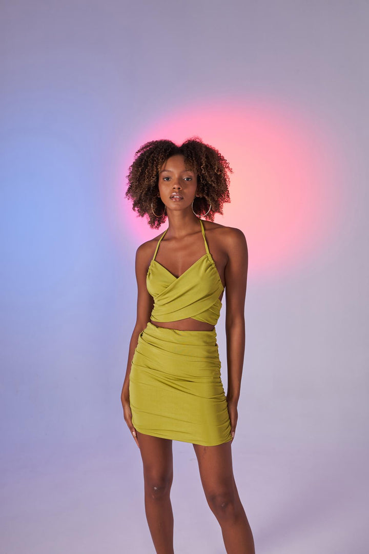 HLLY Women Jessa wears a green blouse. - Woonsocket