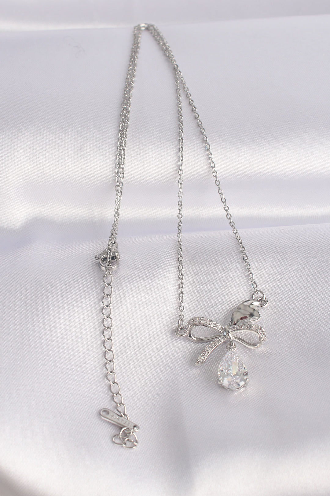 EBJ 316L Stainless Steel Chain Silver Color Zircon Stone Drop Detail Bow Necklace - Long Beach