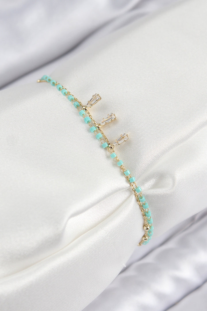 EBJ Gold Color Women's Bracelet with Rice Zircon Stone and Blue Beads - San Remo