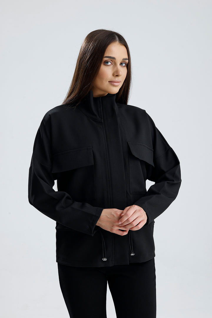 SNS Sense Black Zippered Top Pocketed Waist Stopped Elastic Short Sleeve Hurrem Jacket - Biella