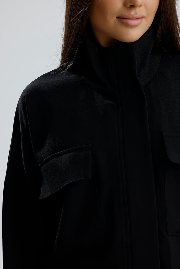 SNS Sense Black Zippered Top Pocketed Waist Stopped Elastic Short Sleeve Hurrem Jacket - Biella