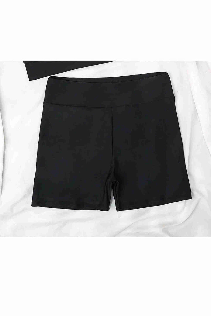 IGR Women Angels in Stylish Black Shorts by the Sea - Uden